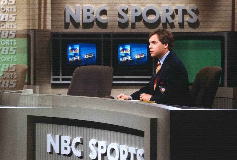 NBC sportscaster Bob Costas covers an NFL football game during the 1985 season.