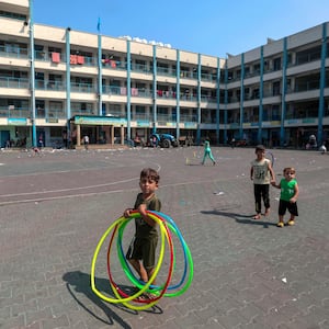 A view from inside the UN school with Palestinians seeking refuge after Israeli airstrikes destroyed homes and buildings in Gaza