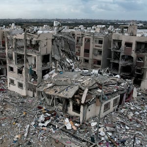 A photo depicting an aerial view showing the destruction caused by Israeli strikes in Wadi Gaza, in the central Gaza Strip