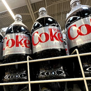 Bottles of Diet Coke which use Aspartame, an artificial sweetener set to be listed as a possible cancer risk by WHO. 