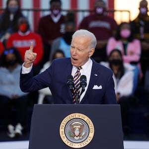 2022-01-11T214929Z_64194734_RC28XR9VNMNS_RTRMADP_3_USA-BIDEN_ctnjks