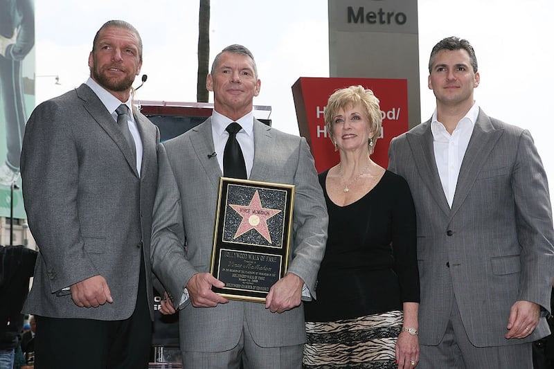 From left to right: Triple H, Vince McMahon, Linda McMahon, and Shane McMahon at the 2,357th Star on the Hollywood Walk of Fame ceremony honoring Vince McMahon.