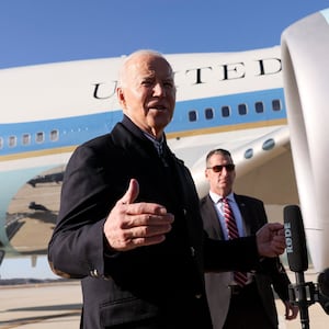 Joe Biden speaks to reporters outside Air Force One.