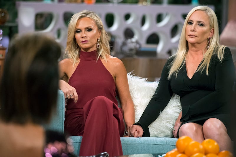 Tamra Judge and Shannon Beador hold hands in support during 2017's Reunion.