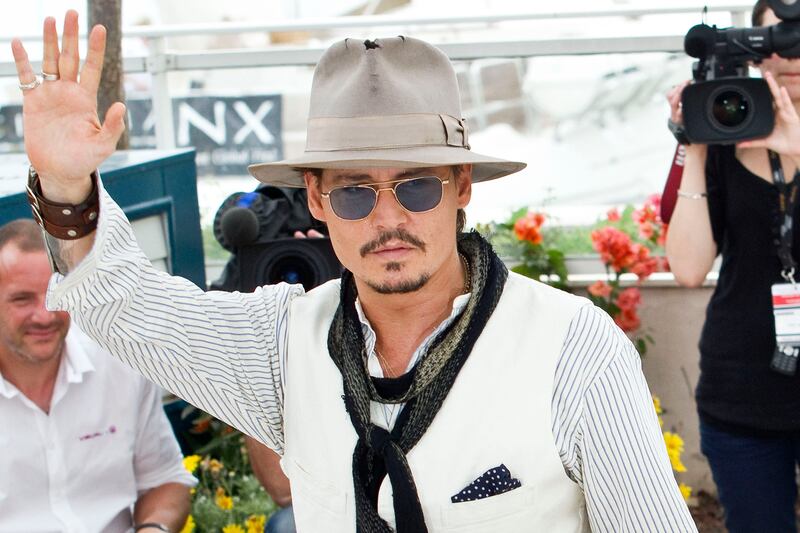 articles/2014/04/21/why-are-all-of-johnny-depp-s-movies-bombing-at-the-box-office/140420-romano-johhny-tease_ldtoat