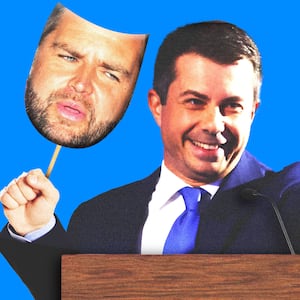 Pete Buttigieg holding a JD Vance mask