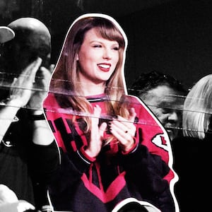 A photo illustration showing Taylor Swift wearing a vintage Kansas City Chiefs jacket while watching a Chief's game.