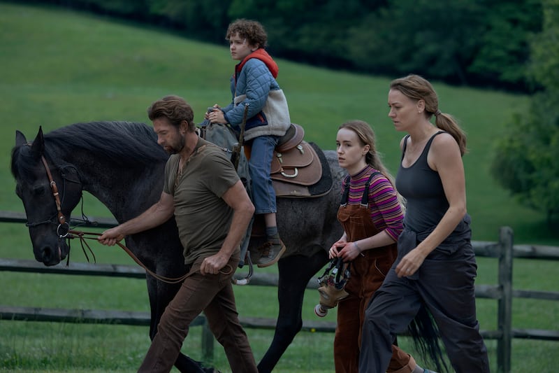 A photo still of Scott Speedman, Caleb Dolden , Emilie Bierre, and Yvonne Strahovski in 'Teacup'