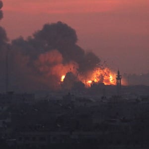 Explosion and smoke caused by Israeli raids seen on Oct. 11, 2023, in Gaza City, Gaza.