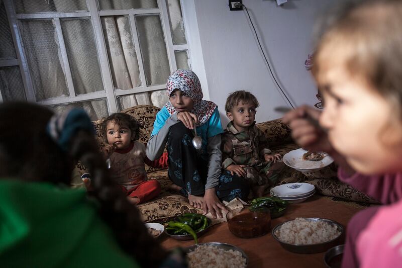 galleries/2013/10/09/the-last-ones-left-photos-of-a-syrian-family-that-refuse-to-leave-their-village/131007-syria-family6_slisb8