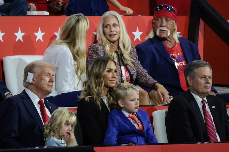 Hulk Hogan speaks with family members of Donald Trump on the fourth day of the Republican National Convention in Milwaukee.