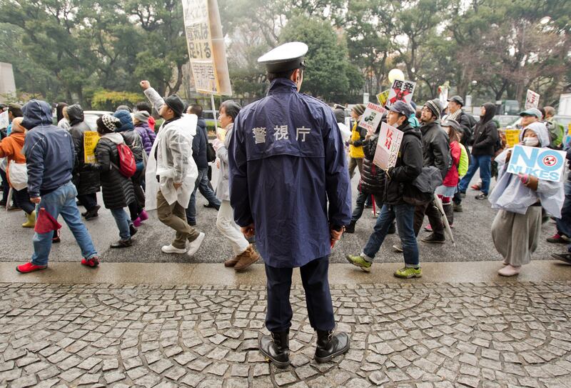 articles/2013/03/18/japan-s-anti-nuclear-activists-losing-ground-since-fukushima-disaster/130318-nuclear-tease.jpg_gzcn0o