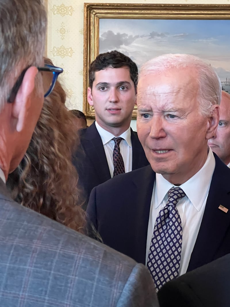 Joe Biden with the impressionist Matt Friend behind him