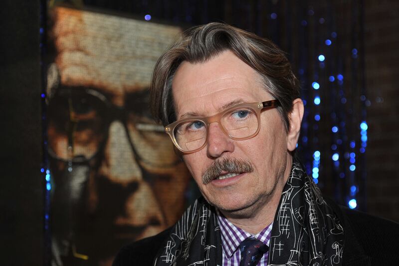 articles/2011/12/07/gary-oldman-talks-tinker-tailor-soldier-spy-batman-retirement/many-faces-of-gary-oldman-intro-tease_cpyhxp