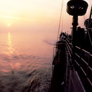 General view of the sunset of the USS Lewis B. Puller