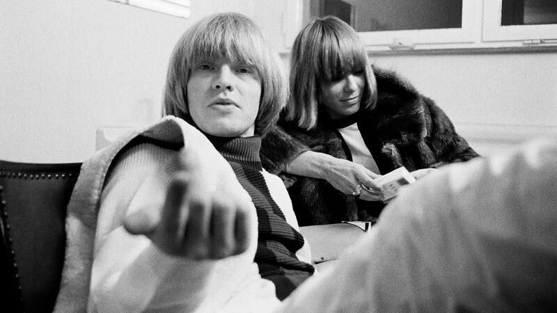 A photo including Anita Pallenberg and Brian Jones 