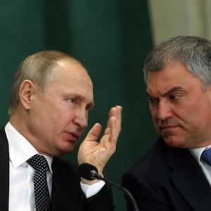 Russian President Vladimir Putin talks to State Duma Speaker Vyacheslav Volodin.