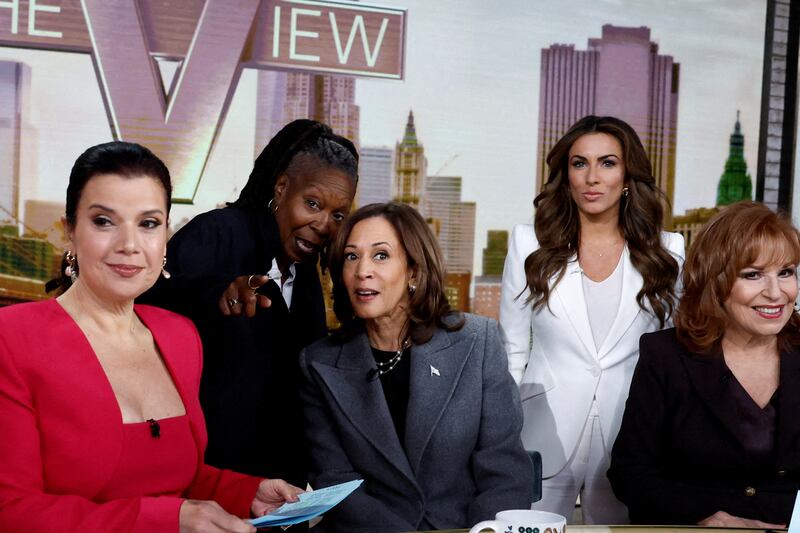 Whoopi Goldberg gestures next to Democratic presidential nominee and U.S. Vice President Kamala Harris as they appear on ABC's "The View" in New York, U.S., Oct. 8, 2024.