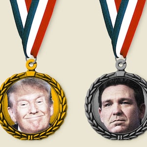 Photo illustration of a gold, silver, and bronze medal with Nikki Haley, Donald Trump and Ron DeSantis’s faces on them.