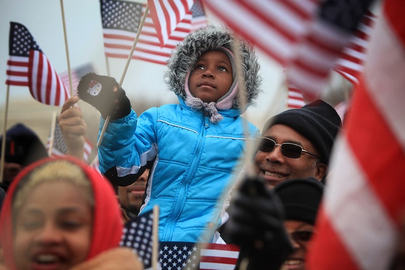 galleries/2013/01/21/president-obama-s-second-inauguration-photos/130121-child-waving-flag-inauguration_ip0ful