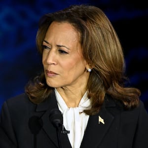 US Vice President Kamala Harris gestures as Donald Trump speaks during a presidential debate at the National Constitution Center in Philadelphia.