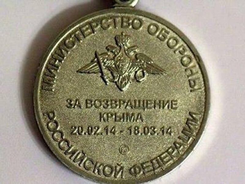 articles/2014/04/25/putin-s-crimean-medal-of-honor-forged-before-the-war-even-began/140424-cathcart-medal-embed_ciih9t