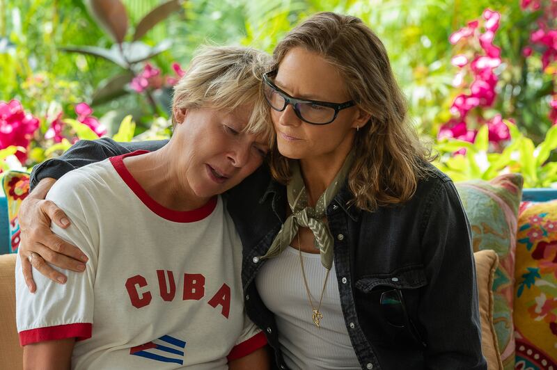 Jodie Foster and Annette Benning hugging in a still from ‘NYAD’