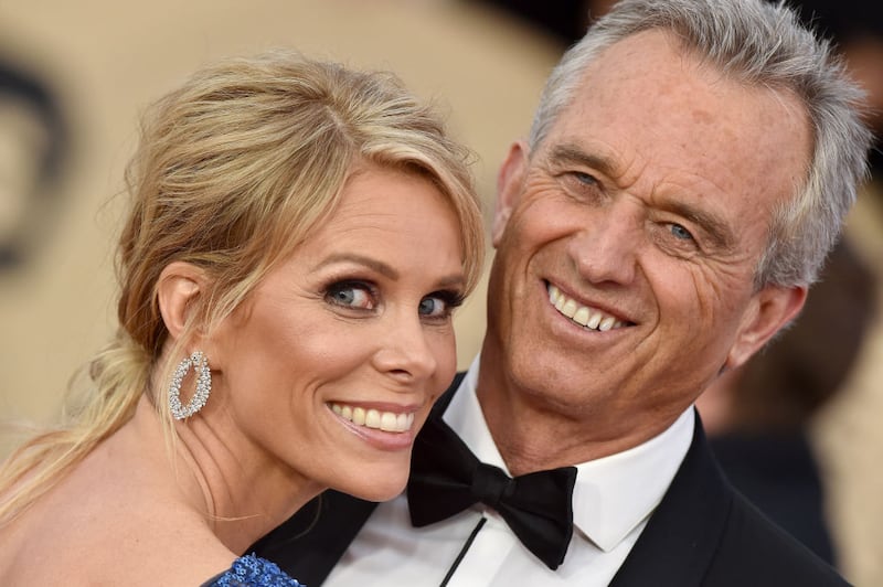 Cheryl Hines and Robert F. Kennedy Jr. smile together.