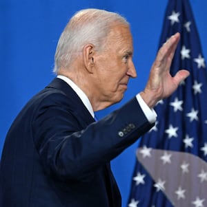 President Joe Biden waves as he leaves after speaking during a press conference at the close of the 75th NATO Summit in Washington, DC.