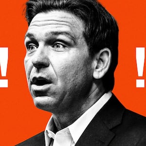 An illustration including a photo of Ron DeSantis and exclamation marks